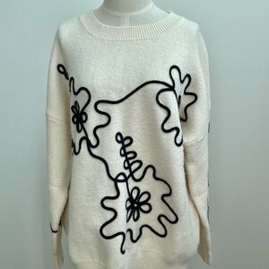 Commense Cream Sweater with Black Abstract Design